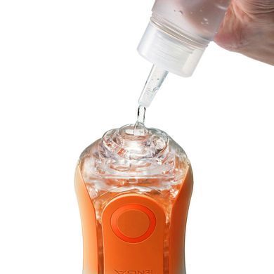 Мастурбатор Tenga Flip Orb &mdash; Sunset Orange, з можливістю зміни тиску та стимулювальними кульками всередині